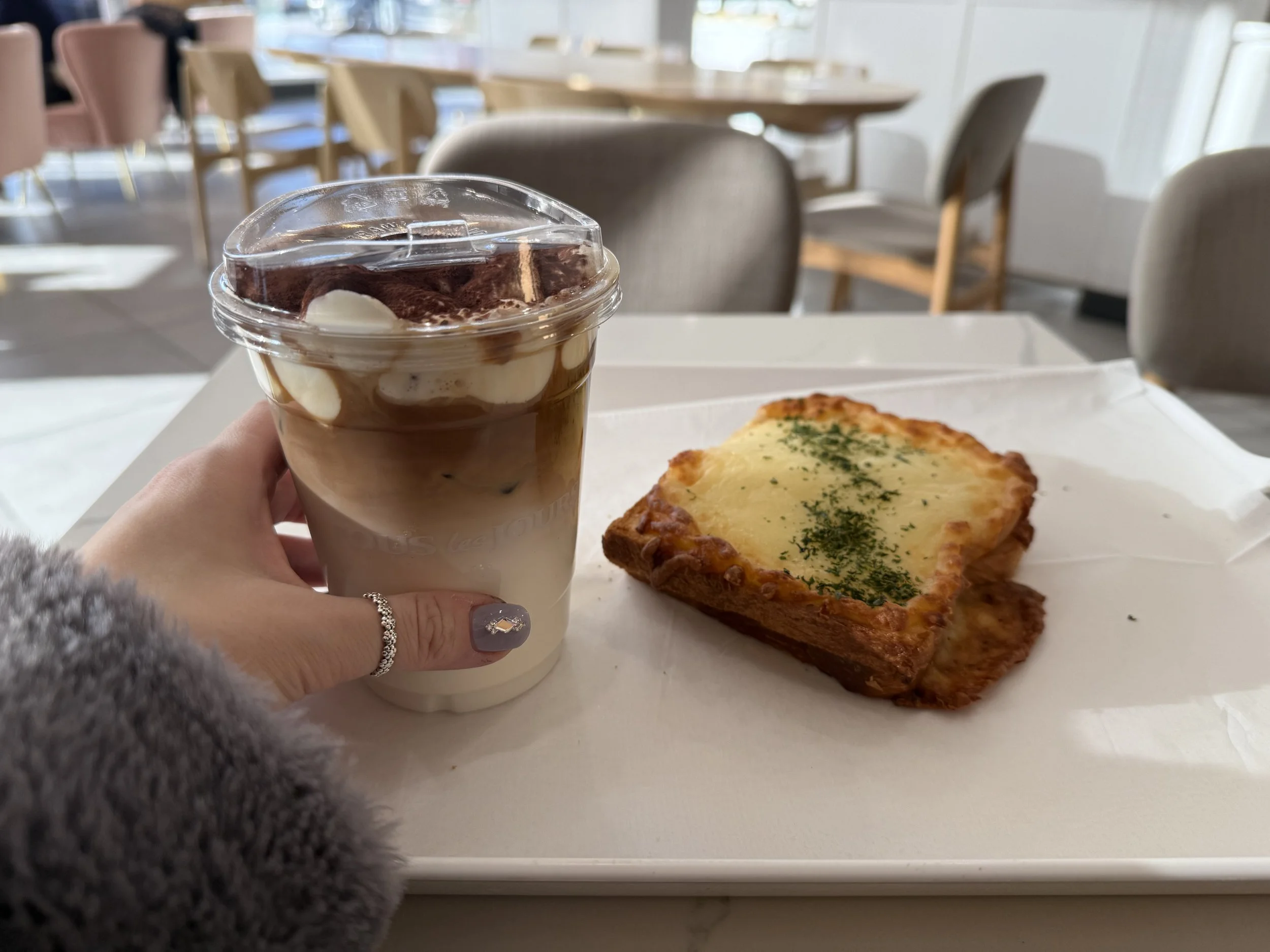 coffee with a pastry on a cafe